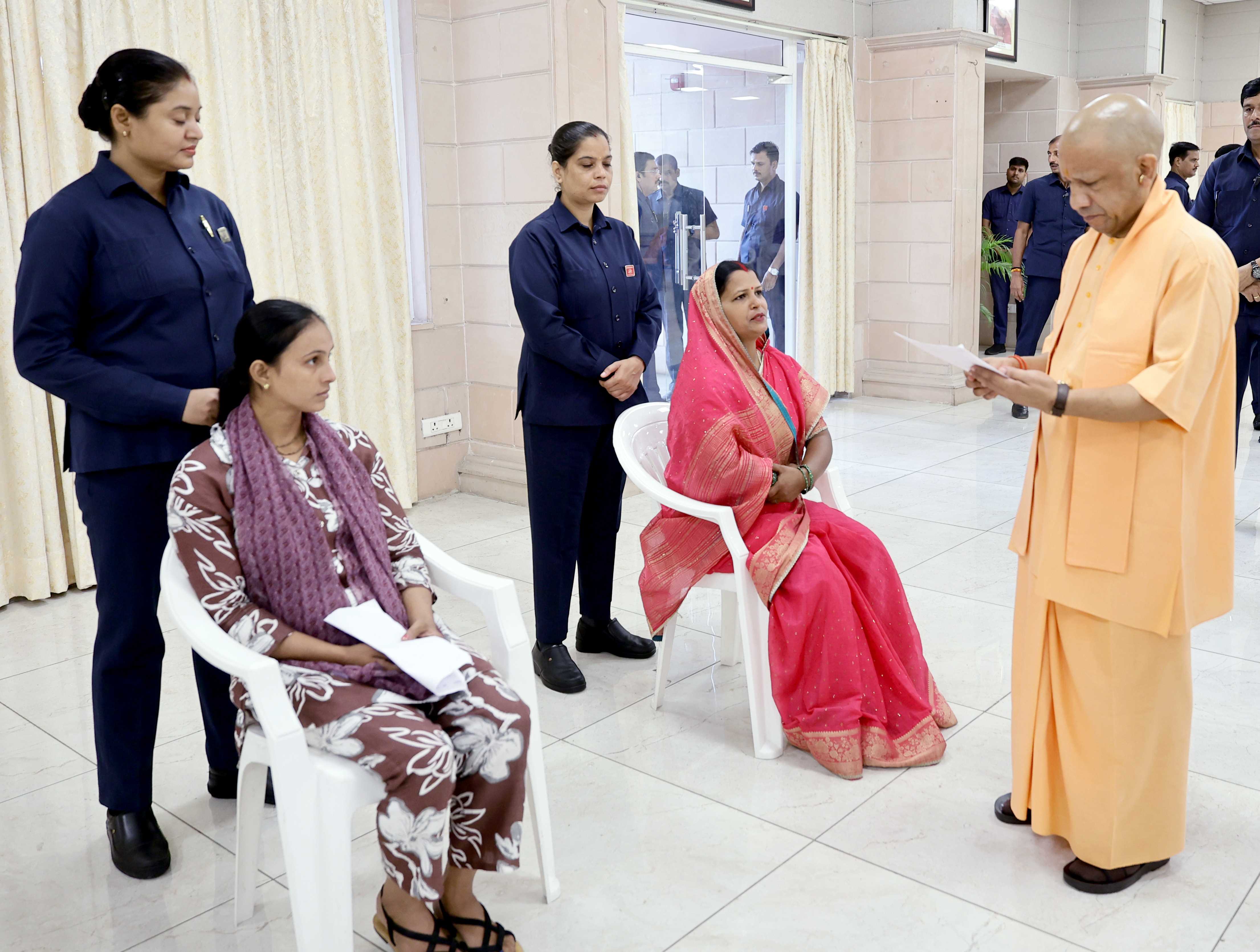 Hon'ble Chief Minister Yogi Adityanath ji listening to the problems of the people in the Janta Darshan organized at his official residence 5-Kalidas Marg, Lucknow on August 24, 2026 and giving instructions to the concerned officials to resolve the public problems on priority basis.